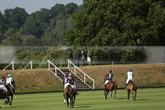 Jaeger Le Coultre (black)  v Wairakei Pastoral (white) in a Jaeger Le Coultre Holden White Cup polo match played on 29 July 2013 at Cowdray Park Polo Club on Brooksfieldwww.polopictures.co.uk
