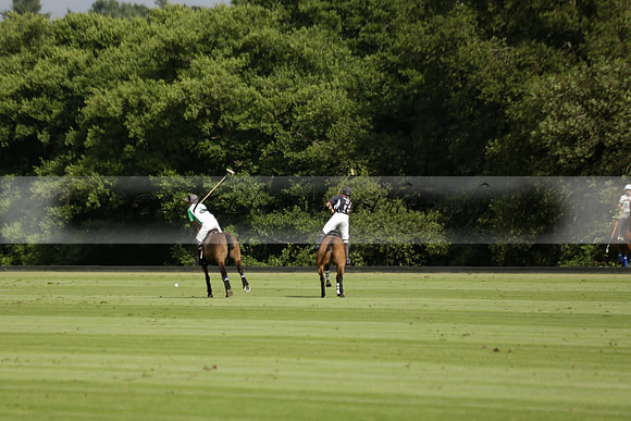 Jaeger Le Coultre (black)  v Wairakei Pastoral (white) in a Jaeger Le Coultre Holden White Cup polo match played on 29 July 2013 at Cowdray Park Polo Club on Brooksfieldwww.polopictures.co.uk