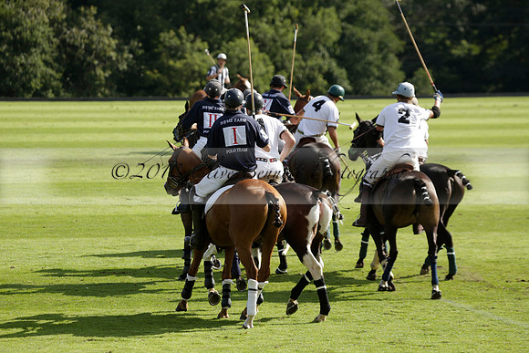 Pandas (white) v Home Farm (navy) in a Park House West Sussex Cup Polo match on Brooksfield at Cowdray Park Polo Club on Friday 30 August 2013. 2013.08.30 www.polopictures.co.uk