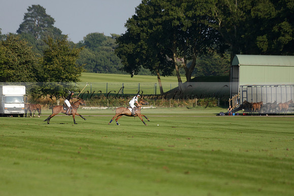 Pluma Negra (white) v Shoreline (black) in the Brecknock Cup Subsidiary final polo match played on Sunday 25 August 2013 at Cowdray Park Polo Club on Ambersham 1. 2013.10.12 www.polopictures.co.uk