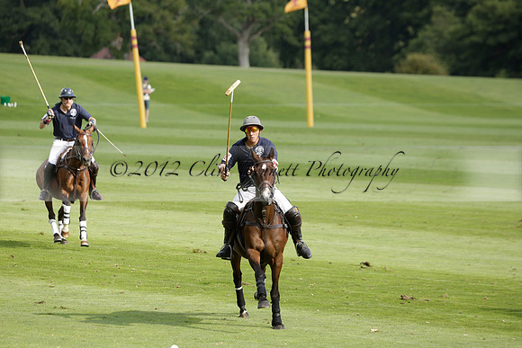 Pandas (white) v Home Farm (navy) in a Park House West Sussex Cup Polo match on Brooksfield at Cowdray Park Polo Club on Friday 30 August 2013. 2013.08.30 www.polopictures.co.uk