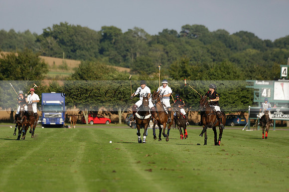 Pluma Negra (white) v Shoreline (black) in the Brecknock Cup Subsidiary final polo match played on Sunday 25 August 2013 at Cowdray Park Polo Club on Ambersham 1. 2013.10.12 www.polopictures.co.uk