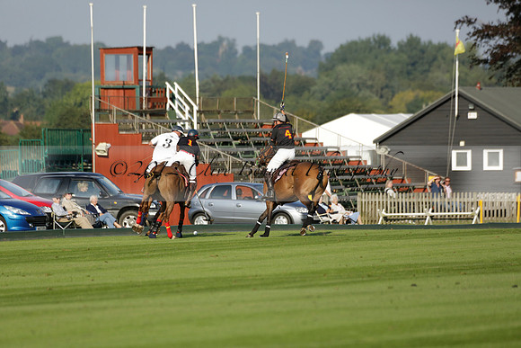 Pluma Negra (white) v Shoreline (black) in the Brecknock Cup Subsidiary final polo match played on Sunday 25 August 2013 at Cowdray Park Polo Club on Ambersham 1. 2013.10.12 www.polopictures.co.uk