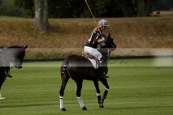 Jaeger Le Coultre (black)  v Wairakei Pastoral (white) in a Jaeger Le Coultre Holden White Cup polo match played on 29 July 2013 at Cowdray Park Polo Club on Brooksfieldwww.polopictures.co.uk