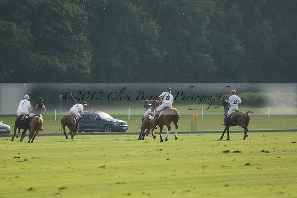 Pluma Negra (white) v Shoreline (black) in the Brecknock Cup Subsidiary final polo match played on Sunday 25 August 2013 at Cowdray Park Polo Club on Ambersham 1. 2013.10.12 www.polopictures.co.uk