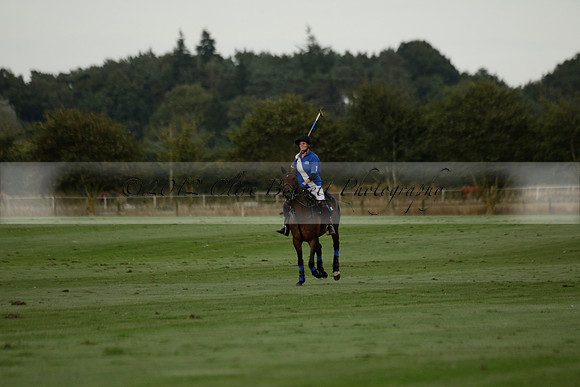 Ghost Chilli (blue) v Team Tonic (red) in a Lodsworth Cup Polo match on Ambersham 3 at Cowdray Park Polo Club on Friday 30 August 2013. 2013.08.30 www.polopictures.co.uk