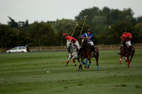 Ghost Chilli (blue) v Team Tonic (red) in a Lodsworth Cup Polo match on Ambersham 3 at Cowdray Park Polo Club on Friday 30 August 2013. 2013.08.30 www.polopictures.co.uk
