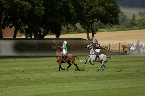 Jaeger Le Coultre (black)  v Wairakei Pastoral (white) in a Jaeger Le Coultre Holden White Cup polo match played on 29 July 2013 at Cowdray Park Polo Club on Brooksfieldwww.polopictures.co.uk