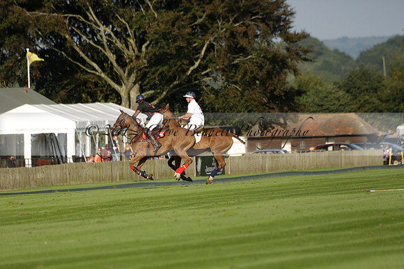 Pluma Negra (white) v Shoreline (black) in the Brecknock Cup Subsidiary final polo match played on Sunday 25 August 2013 at Cowdray Park Polo Club on Ambersham 1. 2013.10.12 www.polopictures.co.uk