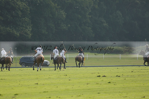 Pluma Negra (white) v Shoreline (black) in the Brecknock Cup Subsidiary final polo match played on Sunday 25 August 2013 at Cowdray Park Polo Club on Ambersham 1. 2013.10.12 www.polopictures.co.uk