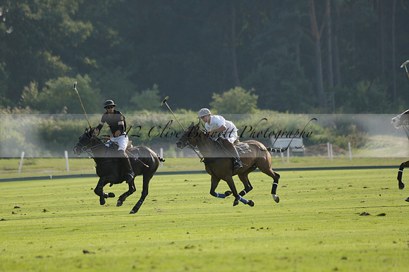 Pluma Negra (white) v Shoreline (black) in the Brecknock Cup Subsidiary final polo match played on Sunday 25 August 2013 at Cowdray Park Polo Club on Ambersham 1. 2013.10.12 www.polopictures.co.uk