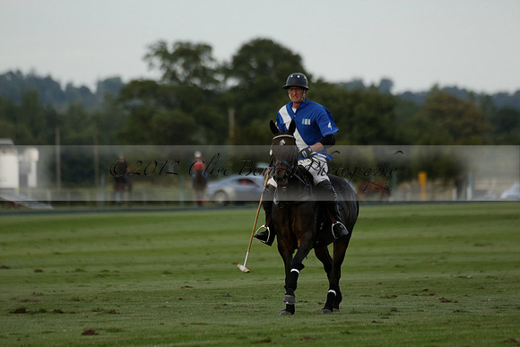 Ghost Chilli (blue) v Team Tonic (red) in a Lodsworth Cup Polo match on Ambersham 3 at Cowdray Park Polo Club on Friday 30 August 2013. 2013.08.30 www.polopictures.co.uk