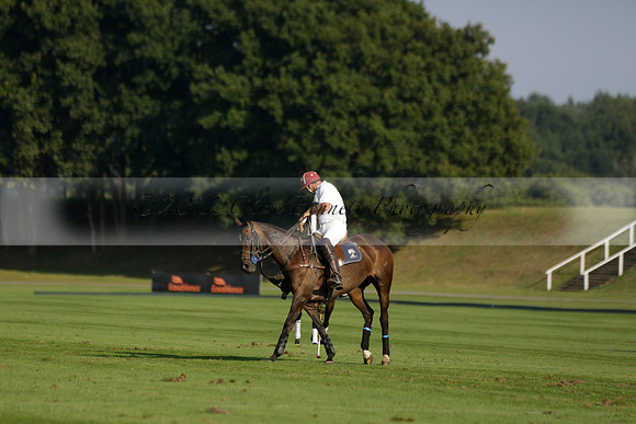 Pluma Negra (white) v Shoreline (black) in the Brecknock Cup Subsidiary final polo match played on Sunday 25 August 2013 at Cowdray Park Polo Club on Ambersham 1. 2013.10.12 www.polopictures.co.uk