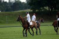 Pluma Negra (white) v Shoreline (black) in the Brecknock Cup Subsidiary final polo match played on Sunday 25 August 2013 at Cowdray Park Polo Club on Ambersham 1. 2013.10.12 www.polopictures.co.uk