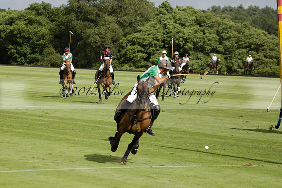Jaeger Le Coultre (black)  v Wairakei Pastoral (white) in a Jaeger Le Coultre Holden White Cup polo match played on 29 July 2013 at Cowdray Park Polo Club on Brooksfieldwww.polopictures.co.uk