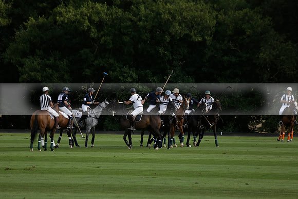 Pandas (white) v Home Farm (navy) in a Park House West Sussex Cup Polo match on Brooksfield at Cowdray Park Polo Club on Friday 30 August 2013. 2013.08.30 www.polopictures.co.uk