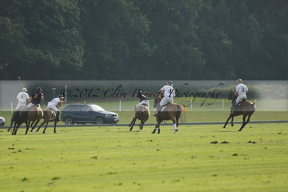 Pluma Negra (white) v Shoreline (black) in the Brecknock Cup Subsidiary final polo match played on Sunday 25 August 2013 at Cowdray Park Polo Club on Ambersham 1. 2013.10.12 www.polopictures.co.uk