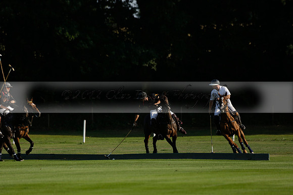 Pluma Negra (white) v Shoreline (black) in the Brecknock Cup Subsidiary final polo match played on Sunday 25 August 2013 at Cowdray Park Polo Club on Ambersham 1. 2013.10.12 www.polopictures.co.uk
