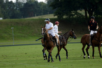 Pluma Negra (white) v Shoreline (black) in the Brecknock Cup Subsidiary final polo match played on Sunday 25 August 2013 at Cowdray Park Polo Club on Ambersham 1. 2013.10.12 www.polopictures.co.uk