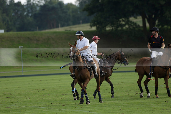 Pluma Negra (white) v Shoreline (black) in the Brecknock Cup Subsidiary final polo match played on Sunday 25 August 2013 at Cowdray Park Polo Club on Ambersham 1. 2013.10.12 www.polopictures.co.uk