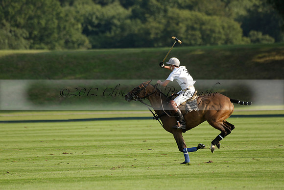 Pluma Negra (white) v Shoreline (black) in the Brecknock Cup Subsidiary final polo match played on Sunday 25 August 2013 at Cowdray Park Polo Club on Ambersham 1. 2013.10.12 www.polopictures.co.uk