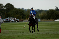 Ghost Chilli (blue) v Team Tonic (red) in a Lodsworth Cup Polo match on Ambersham 3 at Cowdray Park Polo Club on Friday 30 August 2013. 2013.08.30 www.polopictures.co.uk