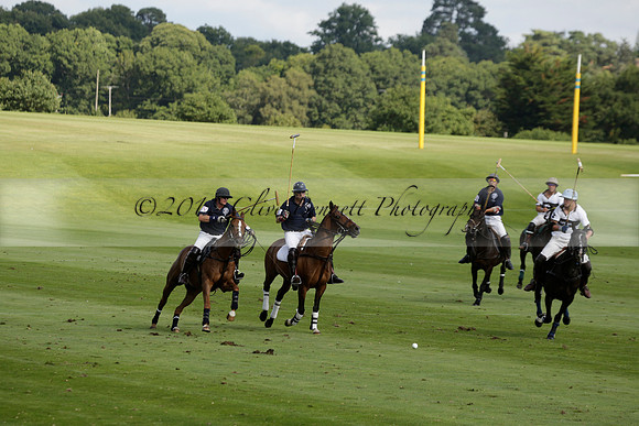 Pandas (white) v Home Farm (navy) in a Park House West Sussex Cup Polo match on Brooksfield at Cowdray Park Polo Club on Friday 30 August 2013. 2013.08.30 www.polopictures.co.uk