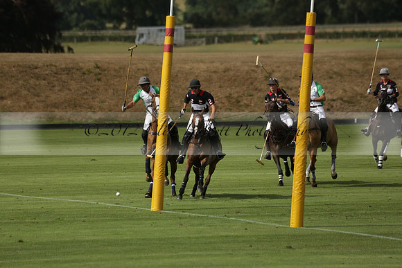 Jaeger Le Coultre (black)  v Wairakei Pastoral (white) in a Jaeger Le Coultre Holden White Cup polo match played on 29 July 2013 at Cowdray Park Polo Club on Brooksfieldwww.polopictures.co.uk