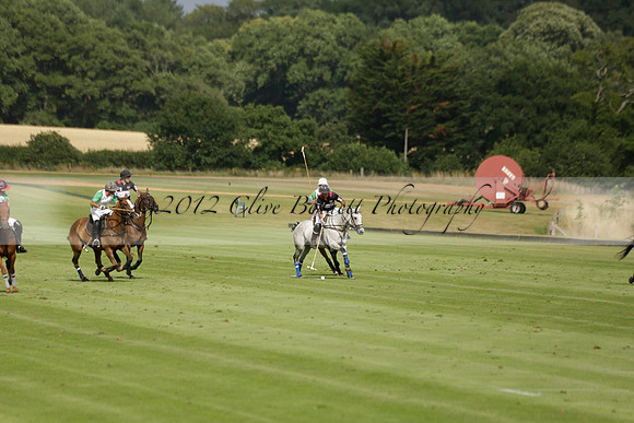 Jaeger Le Coultre (black)  v Wairakei Pastoral (white) in a Jaeger Le Coultre Holden White Cup polo match played on 29 July 2013 at Cowdray Park Polo Club on Brooksfieldwww.polopictures.co.uk