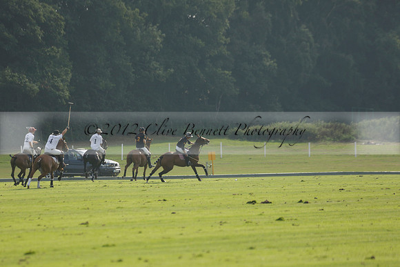 Pluma Negra (white) v Shoreline (black) in the Brecknock Cup Subsidiary final polo match played on Sunday 25 August 2013 at Cowdray Park Polo Club on Ambersham 1. 2013.10.12 www.polopictures.co.uk