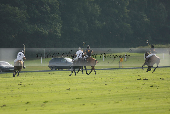 Pluma Negra (white) v Shoreline (black) in the Brecknock Cup Subsidiary final polo match played on Sunday 25 August 2013 at Cowdray Park Polo Club on Ambersham 1. 2013.10.12 www.polopictures.co.uk