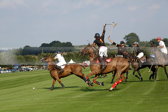 Pluma Negra (white) v Shoreline (black) in the Brecknock Cup Subsidiary final polo match played on Sunday 25 August 2013 at Cowdray Park Polo Club on Ambersham 1. 2013.10.12 www.polopictures.co.uk