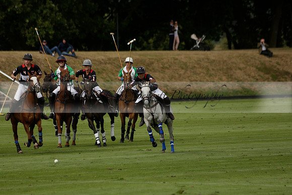 Jaeger Le Coultre (black)  v Wairakei Pastoral (white) in a Jaeger Le Coultre Holden White Cup polo match played on 29 July 2013 at Cowdray Park Polo Club on Brooksfieldwww.polopictures.co.uk