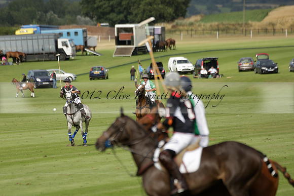 Jaeger Le Coultre (black)  v Wairakei Pastoral (white) in a Jaeger Le Coultre Holden White Cup polo match played on 29 July 2013 at Cowdray Park Polo Club on Brooksfieldwww.polopictures.co.uk