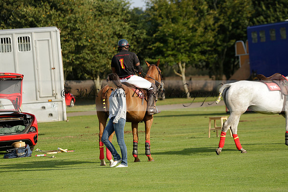 Pluma Negra (white) v Shoreline (black) in the Brecknock Cup Subsidiary final polo match played on Sunday 25 August 2013 at Cowdray Park Polo Club on Ambersham 1. 2013.10.12 www.polopictures.co.uk