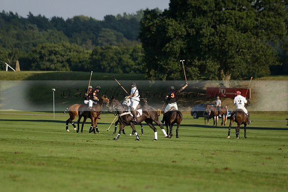 Pluma Negra (white) v Shoreline (black) in the Brecknock Cup Subsidiary final polo match played on Sunday 25 August 2013 at Cowdray Park Polo Club on Ambersham 1. 2013.10.12 www.polopictures.co.uk