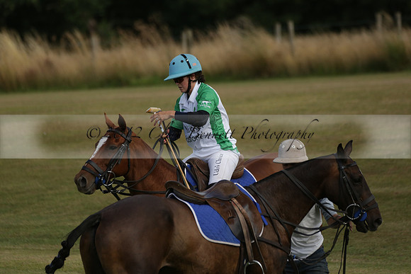 Jaeger Le Coultre (black)  v Wairakei Pastoral (white) in a Jaeger Le Coultre Holden White Cup polo match played on 29 July 2013 at Cowdray Park Polo Club on Brooksfieldwww.polopictures.co.uk