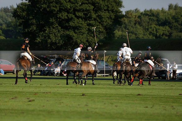 Pluma Negra (white) v Shoreline (black) in the Brecknock Cup Subsidiary final polo match played on Sunday 25 August 2013 at Cowdray Park Polo Club on Ambersham 1. 2013.10.12 www.polopictures.co.uk
