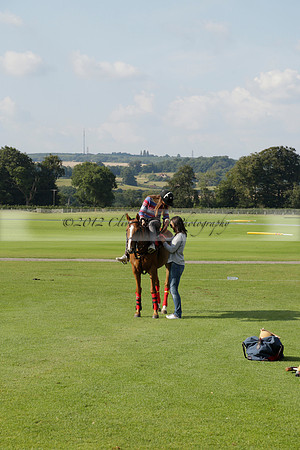 Pluma Negra (white) v Shoreline (black) in the Brecknock Cup Subsidiary final polo match played on Sunday 25 August 2013 at Cowdray Park Polo Club on Ambersham 1. 2013.10.12 www.polopictures.co.uk