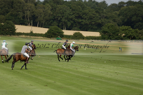 Jaeger Le Coultre (black)  v Wairakei Pastoral (white) in a Jaeger Le Coultre Holden White Cup polo match played on 29 July 2013 at Cowdray Park Polo Club on Brooksfieldwww.polopictures.co.uk