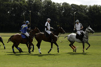 Combe Place (blue) v Silver Fox (white) in a Park House West Sussex Cup Polo match on Ambersham 1 at Cowdray Park Polo Club on Friday 30 August 2013. 2013.08.30 www.polopictures.co.uk