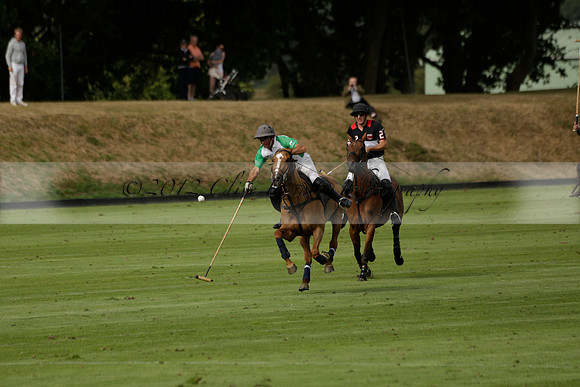 Jaeger Le Coultre (black)  v Wairakei Pastoral (white) in a Jaeger Le Coultre Holden White Cup polo match played on 29 July 2013 at Cowdray Park Polo Club on Brooksfieldwww.polopictures.co.uk