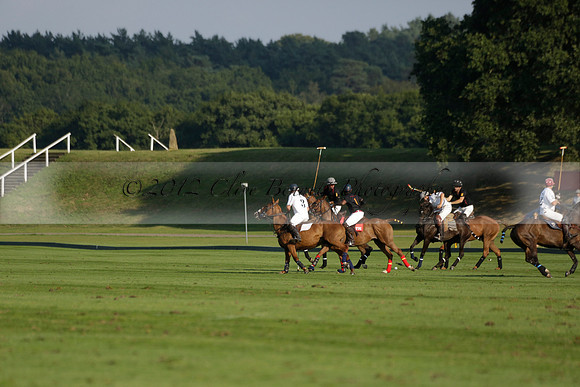 Pluma Negra (white) v Shoreline (black) in the Brecknock Cup Subsidiary final polo match played on Sunday 25 August 2013 at Cowdray Park Polo Club on Ambersham 1. 2013.10.12 www.polopictures.co.uk