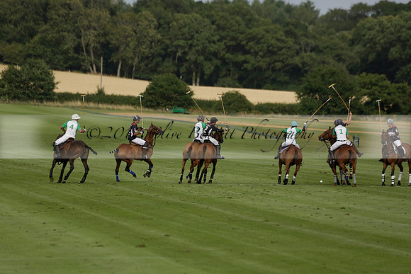 Jaeger Le Coultre (black)  v Wairakei Pastoral (white) in a Jaeger Le Coultre Holden White Cup polo match played on 29 July 2013 at Cowdray Park Polo Club on Brooksfieldwww.polopictures.co.uk