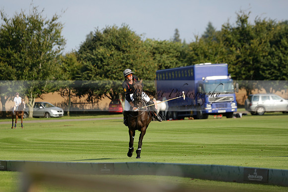 Pluma Negra (white) v Shoreline (black) in the Brecknock Cup Subsidiary final polo match played on Sunday 25 August 2013 at Cowdray Park Polo Club on Ambersham 1. 2013.10.12 www.polopictures.co.uk