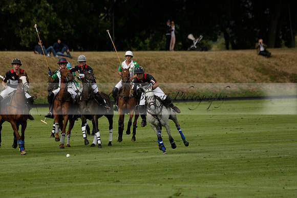 Jaeger Le Coultre (black)  v Wairakei Pastoral (white) in a Jaeger Le Coultre Holden White Cup polo match played on 29 July 2013 at Cowdray Park Polo Club on Brooksfieldwww.polopictures.co.uk