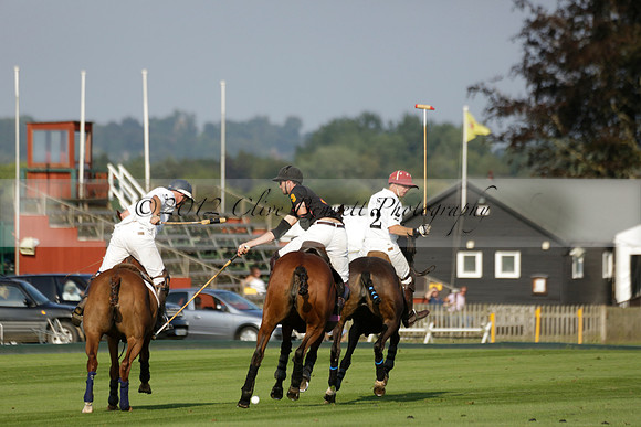 Pluma Negra (white) v Shoreline (black) in the Brecknock Cup Subsidiary final polo match played on Sunday 25 August 2013 at Cowdray Park Polo Club on Ambersham 1. 2013.10.12 www.polopictures.co.uk