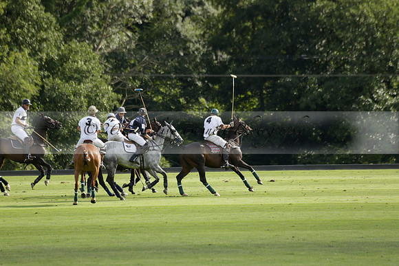 Pandas (white) v Home Farm (navy) in a Park House West Sussex Cup Polo match on Brooksfield at Cowdray Park Polo Club on Friday 30 August 2013. 2013.08.30 www.polopictures.co.uk