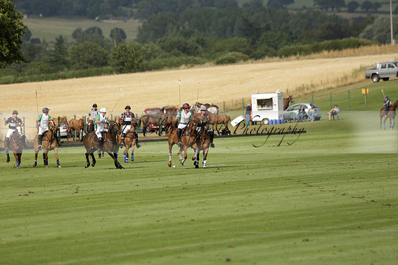Jaeger Le Coultre (black)  v Wairakei Pastoral (white) in a Jaeger Le Coultre Holden White Cup polo match played on 29 July 2013 at Cowdray Park Polo Club on Brooksfieldwww.polopictures.co.uk