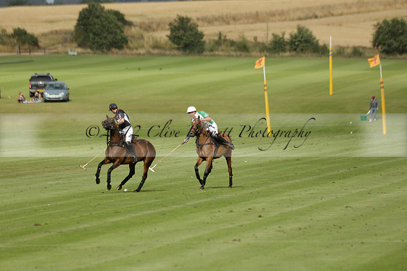 Jaeger Le Coultre (black)  v Wairakei Pastoral (white) in a Jaeger Le Coultre Holden White Cup polo match played on 29 July 2013 at Cowdray Park Polo Club on Brooksfieldwww.polopictures.co.uk